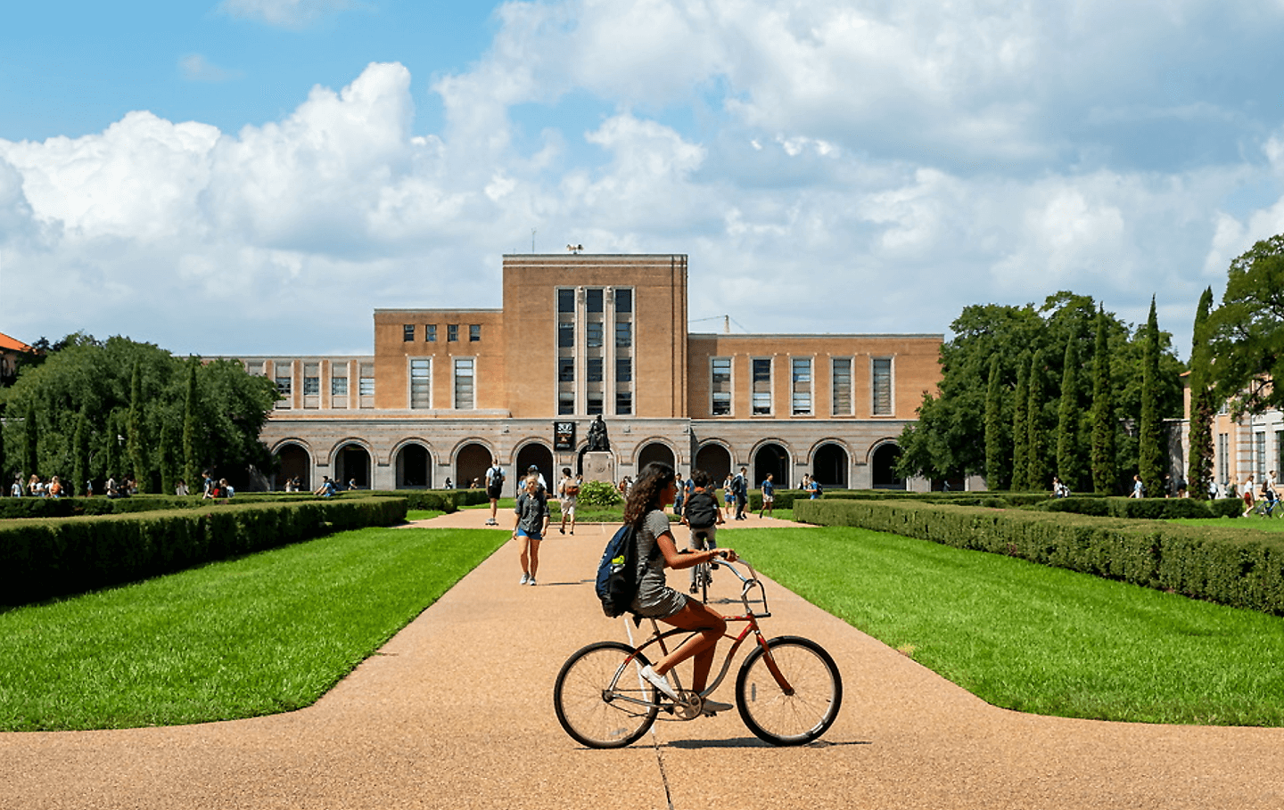 Rice Virtual Tour Student on Bike
